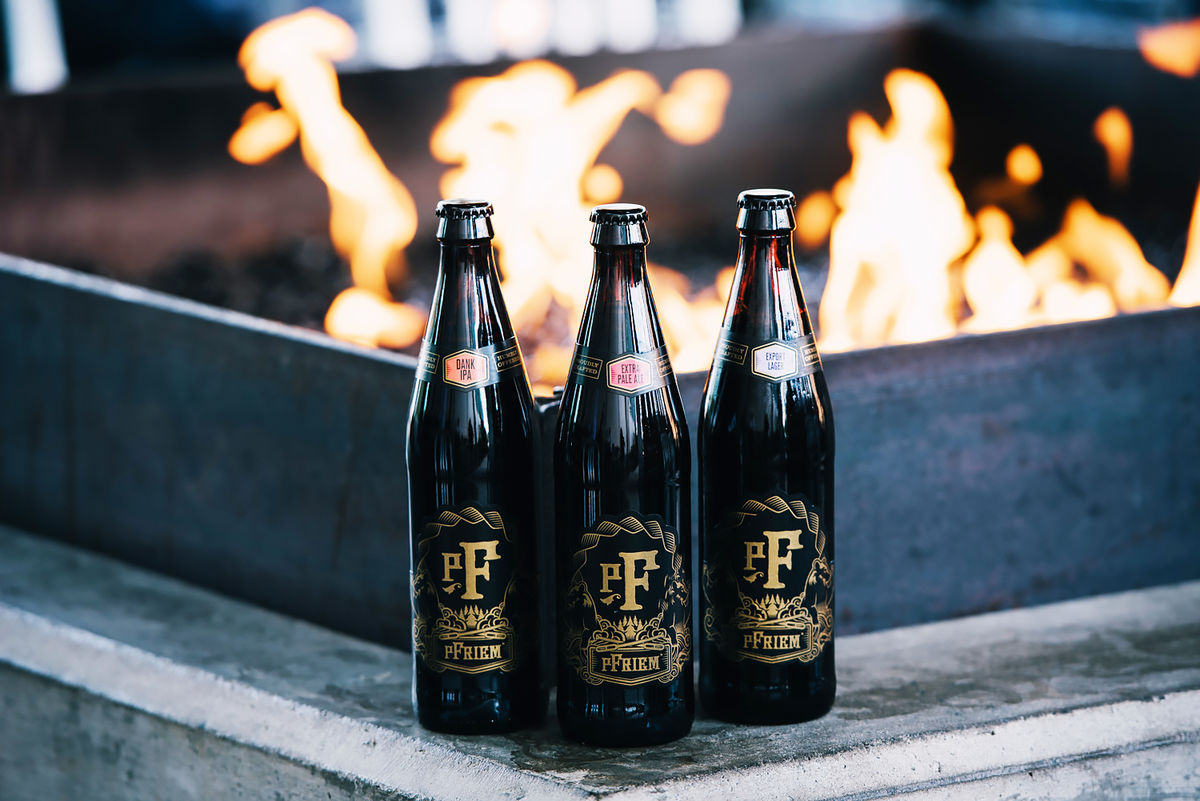 limited release pfriem beers in front of a fire pit