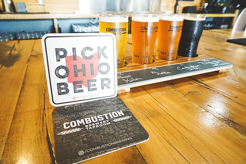 flight of combustion brewery beers in the taproom