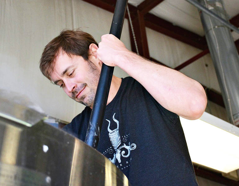 Stuffings stirs the mash. (Photo Courtesy of Jester King Brewery)