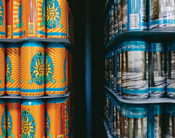 Oberon and Winter White cans.