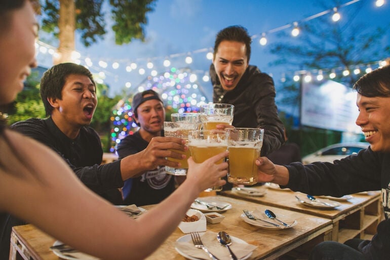 Group Of Friends enjoying the party and having evening drinks alternative to beer