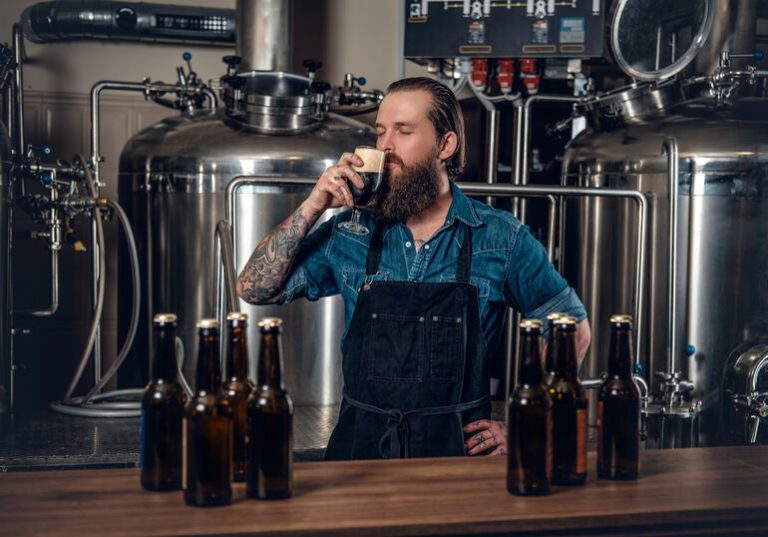 Man tasting beer in a brewery