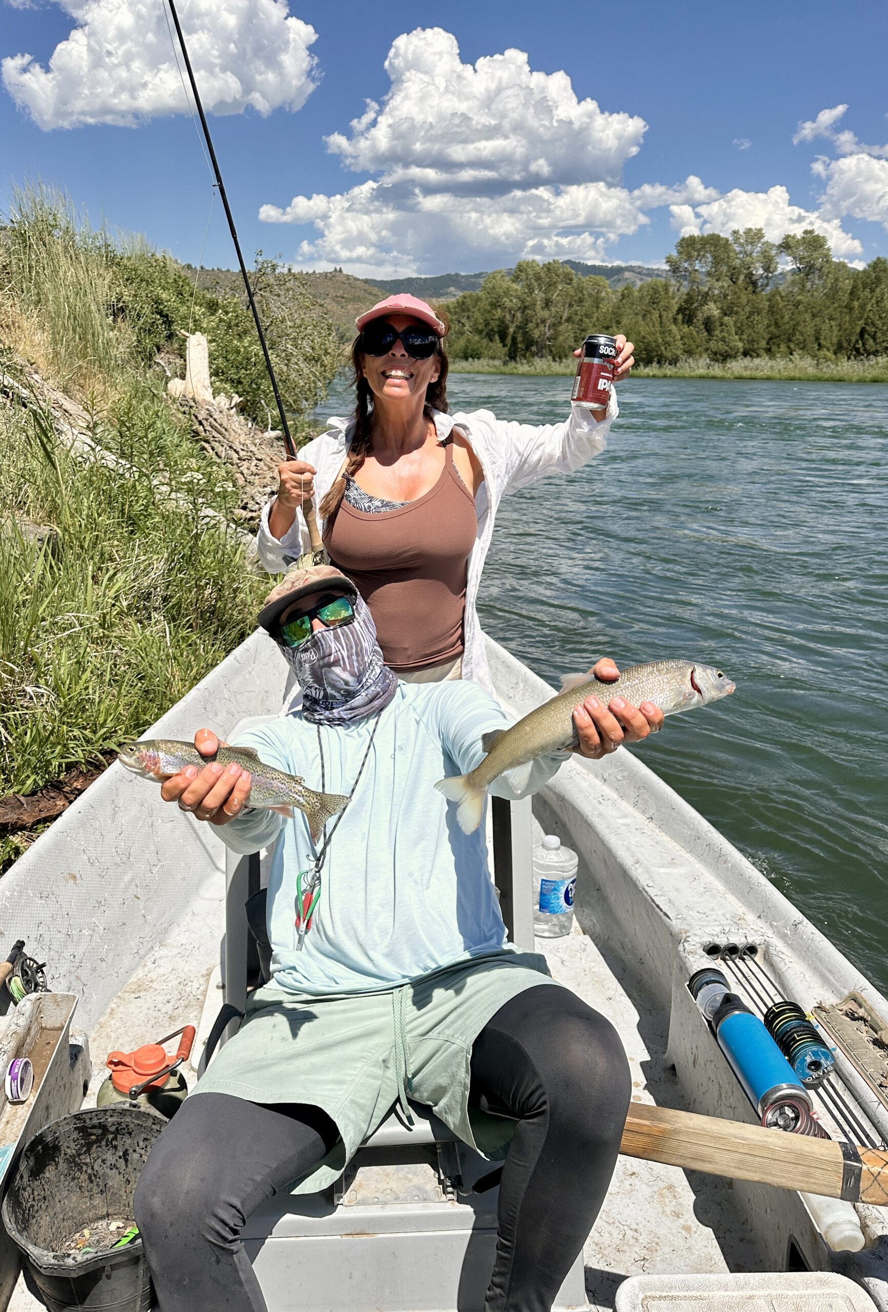 The author Heide Brandes catching some fish and enjoying a local IPA.