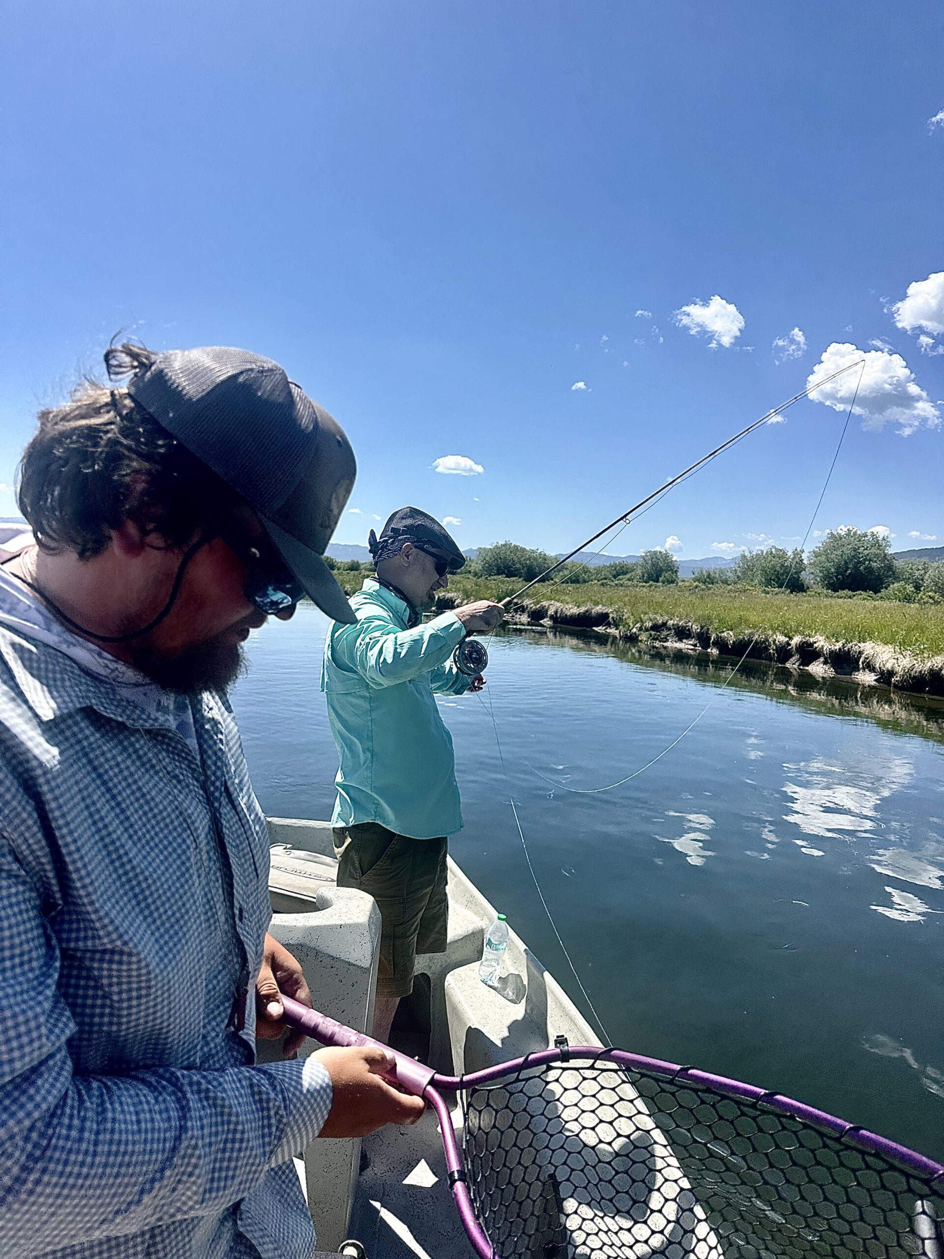 Fly fishing from a boat on the Teton River.