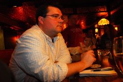 John Holl sitting at a bar